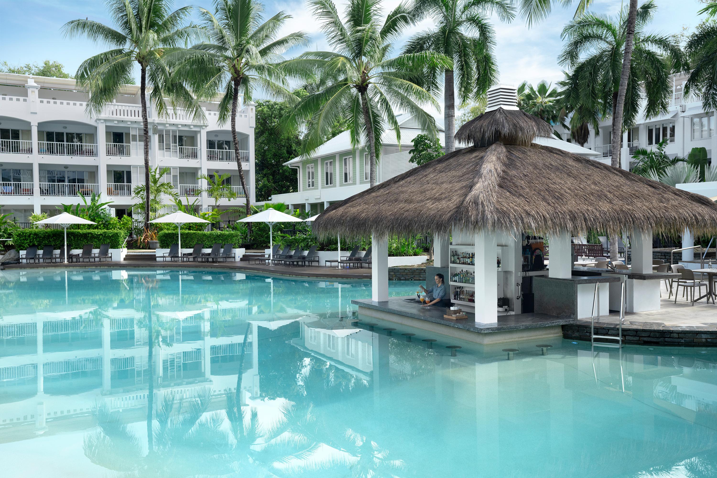 Peppers Beach Club & Spa Palm Cove Extérieur photo The swimming pool at the resort